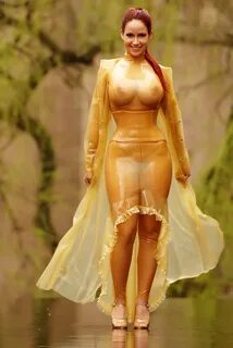 Redhead Girl wearing Yellow Latex See Through Long Dress and