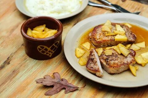 Pork chops with apple sauce Stock Photo by © foreverbluebird