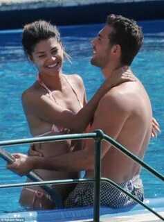 Jessica Szohr gets very touchy feely during a swim with new 