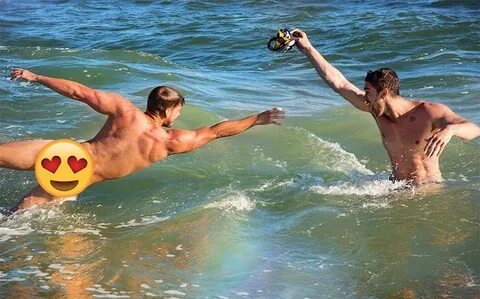 Max Emerson and boyfriend strip naked for a dip in the ocean