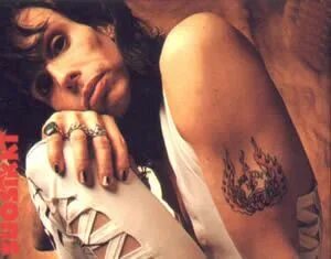 Steven Tyler's "Ma' Kin" tattoo. It's short for "Mama Kin," 