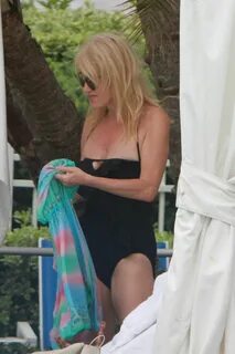KELLYANNE CONWAY in Swumsuit at a Pool in Miami 11/28/2016 -