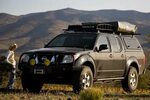 Nissan Frontier with ARE Series V Camper Shell with the swin