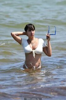 Jackie Cruz cleavage in white bikini on the beach in Miami B
