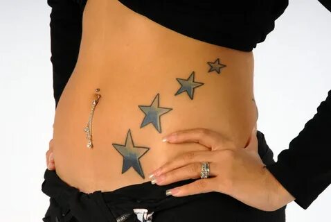 Файл:Woman with four star tattoos on her belly, and a navel 