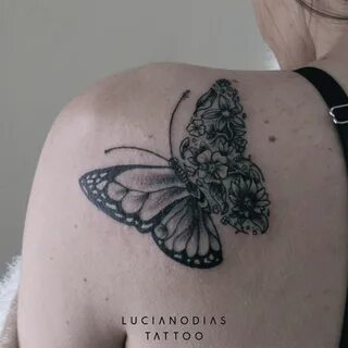 Half butterfly, half flowers blackwork tattoo made by me at 