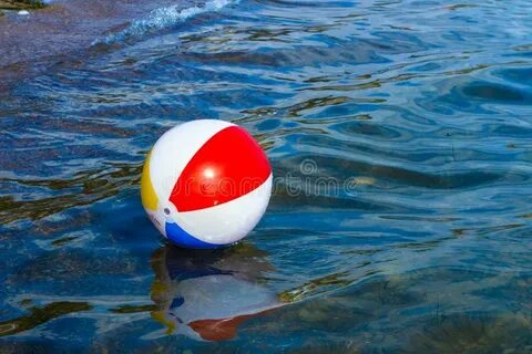 Beach Inflatable Ball Floating in the Water Stock Image - Im