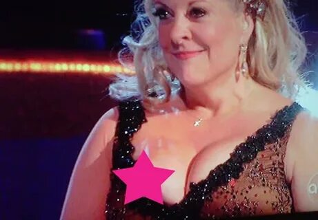 Nancy Grace's Brown Nipple Pops Out During Performance - the
