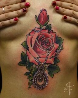 Rose sternum tattoo by Anthony Flemming Rose tattoos for gir