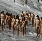 Hundreds of naked volunteers brave cold for glacier photo Da
