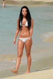 Tulisa Contostavlos wearing tiny white bikini at the beach i