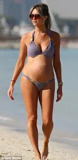 Georgina Dorsett proudly shows off her growing pregnancy cur