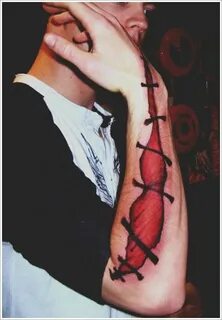 35 Amazing Ripped Skin Tattoo Art Designs Ripped skin tattoo