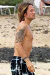 Shirtless Keith Urban shows Nicole Kidman tattoo in Hawaii a
