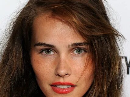 Brownish red hair w/ bright red lips. *Isabel Lucas Isabel l