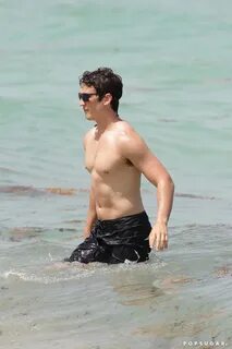 Miles Teller and His Girlfriend on the Beach in Miami POPSUG