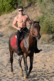 Man Riding A Horse