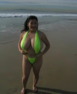 Plump Latina Wearing Green Suspender Swimsuit - Nuded Photo