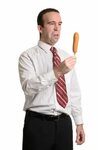 A man who doesn't quite grasp the idea behind a corndog: Sto
