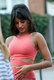 Jasmin Walia out and about shows pokies in pink dress in Che