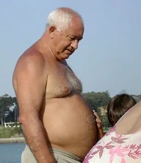 White hair belly grandpa in grey pants at the sea - Page of 