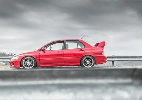 Rally Red Evo 9 MR Testing out the new glass. ps. the car . 