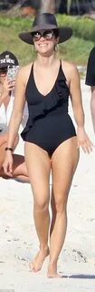 Timeless star Abigail Spencer flaunts beach body in black sw