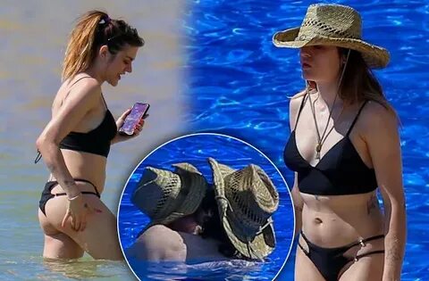 Frances Bean shows off her bikini body on a tropical getaway