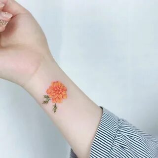 Marigold tattoo on the wrist. Tattoo minimalistas, Tatuajes,