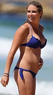 Candice Falzon covers up pregnancy figure in roomy shift dre