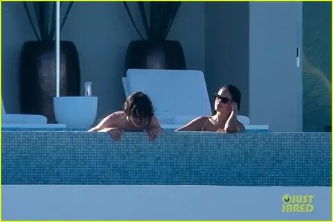 Timothee Chalamet & Eiza Gonzalez Get Steamy in the Pool Tog