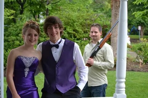 Prom Picture Protective Father in the background. Prom pictu