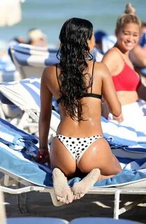 Karrueche Tran showing off her awesome curves in a tiny polk