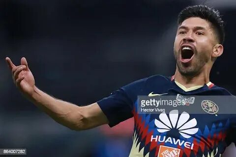 Oribe Peralta of America celebrates after scoring the first 