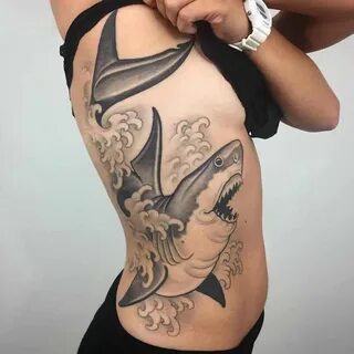shark tattoo on rib.