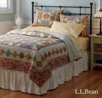 L.L.Bean's Lakehouse Bed and handstitched floral quilt lend 