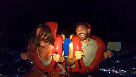 Boobs popping out on slingshot ride.