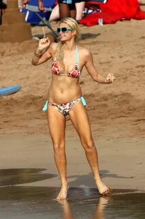 Paris Hilton wearing skimpy bikini on the Hawaiian beach