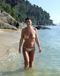 Sweet nude mature column at beach - TheMaturePornPics.com