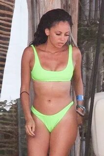 Vanessa Morgan - In a neon bikini enjoys on the beach in Tul