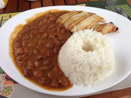 Costilla, arroz, menestra, ensalada y papa al horno - Pictur