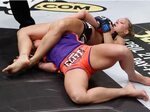 43. Ronda Rousey secures the armbar on Miesha Tate Business 