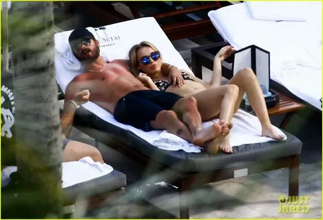 Scott Disick Cuddles By the Pool with Another Woman in Miami