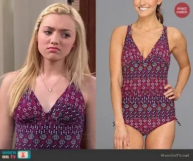 Emma’s purple and pink printed one-piece swimsuit on Jessie 