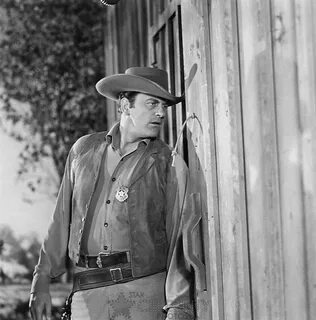 Gunsmoke photo 091 James Arness peeking through door James a