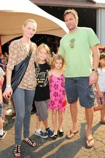 Amber Valletta and husband Chip McCaw with their son. Amber 