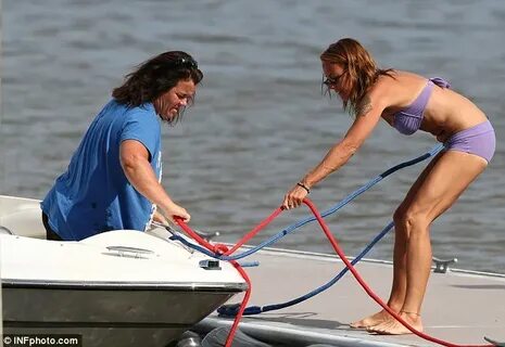 All aboard! Rosie O'Donnell and her bikini clad girlfriend T