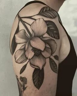 great floral tattoo, looks like a magnolia Magnolia tattoo, 