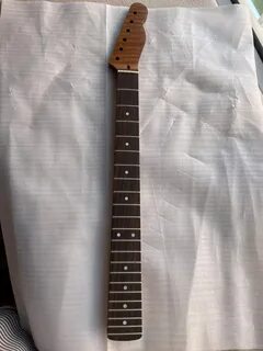 Dye a rosewood fretboard to look like ebony