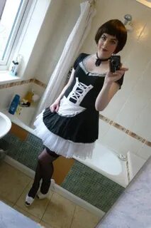 WORLD OF CROSSDRESSING: Crossdresser in maid outfit